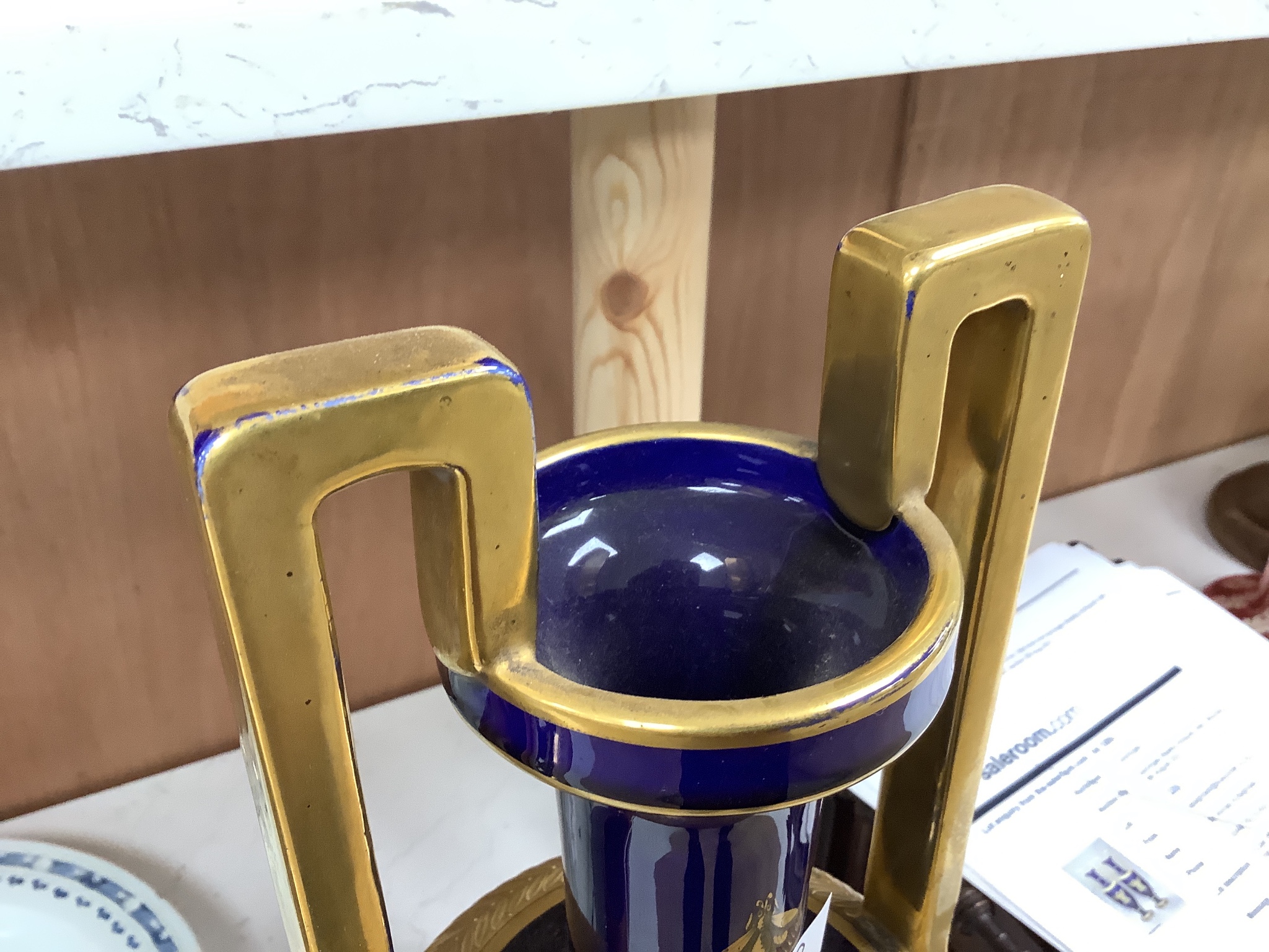 A pair of French gilt blue porcelain two handled vases, height 45cm